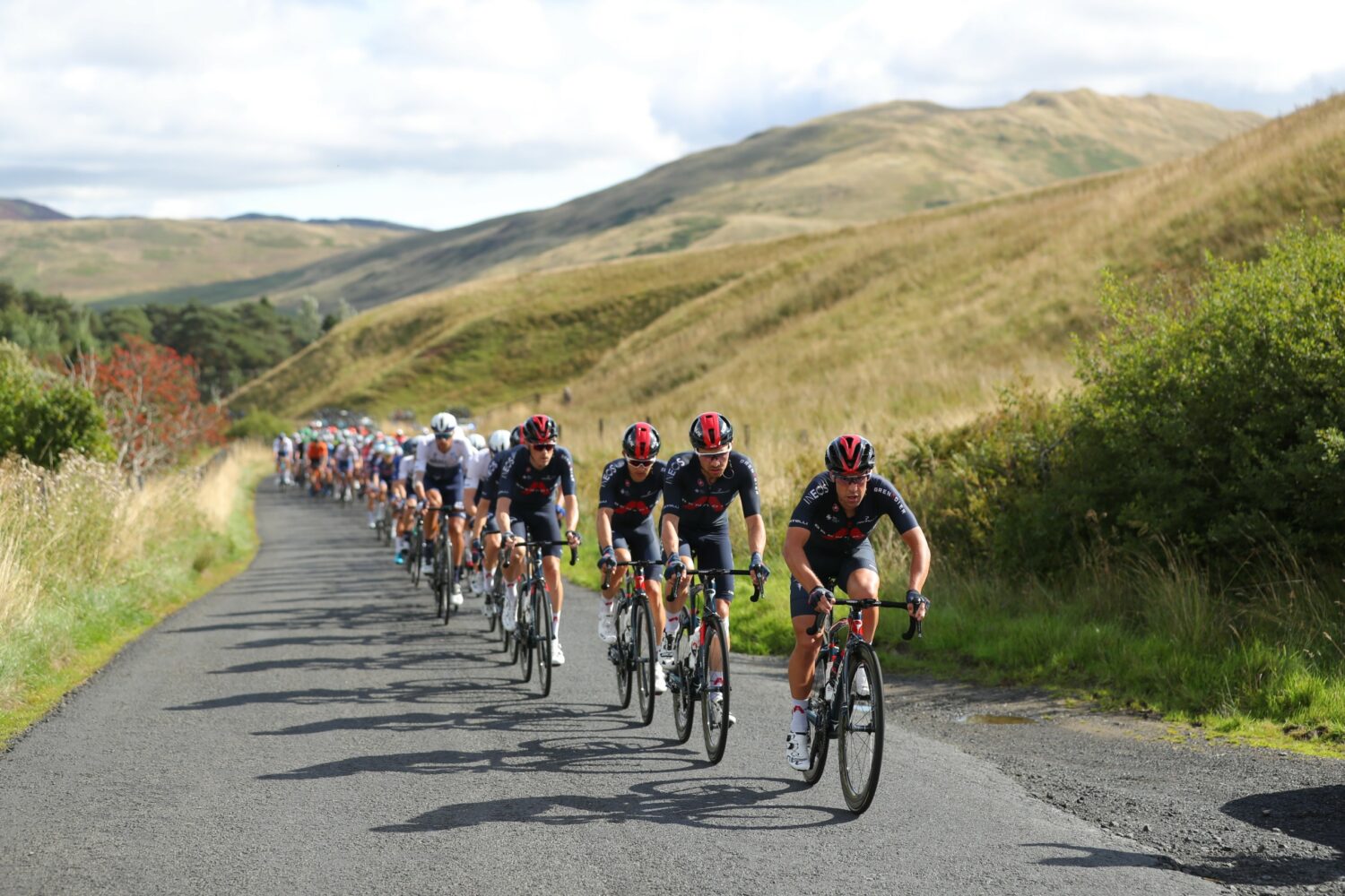 Tour of Britain Cyclists riding through hills